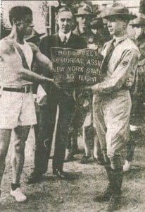 Relay runners hand off the Roosevelt flag