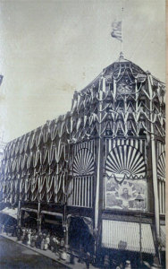 A Boston building is covered with mourning symbols for Grant and topped by a flag at half-staff. (Massachusetts Historical Society)