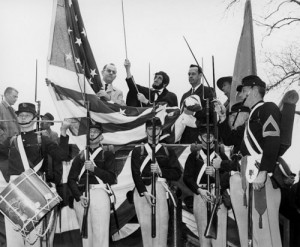 On the 100th anniversary, Kansans portray President Lincoln's 1861 hoisting of the 34-star flag in Philadelphia, Pennsylvania, when their state entered the U.S. (Photo from Kansas Memory)