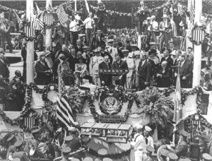 President Coolidge and Charles Lindbergh on a flag-draped podium in 1927. (Library of Congress)