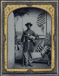 A Civil War soldier poses with a flag ca 1863. (Library of Congress)