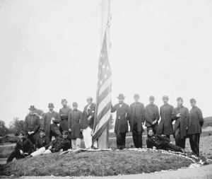 Troops lower American flag in Washington, D.C., during the War Between the States. (Library of Congress)