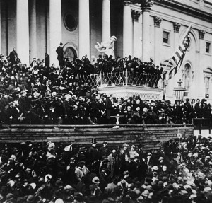 As a flag flaps, Lincoln delivers his second inaugural address in 1865. (Library of Congress)