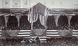 Grover Cleveland, from his reviewing stand, watches his 1885 inauguration parade. (Library of Congress)