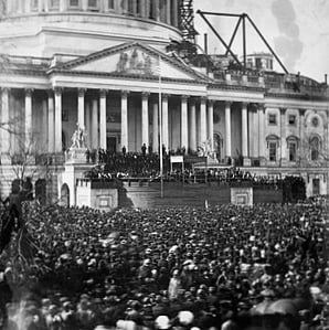 Lincoln's first inauguration with a flag flapping wildly in the wind. (wikipedia.org)